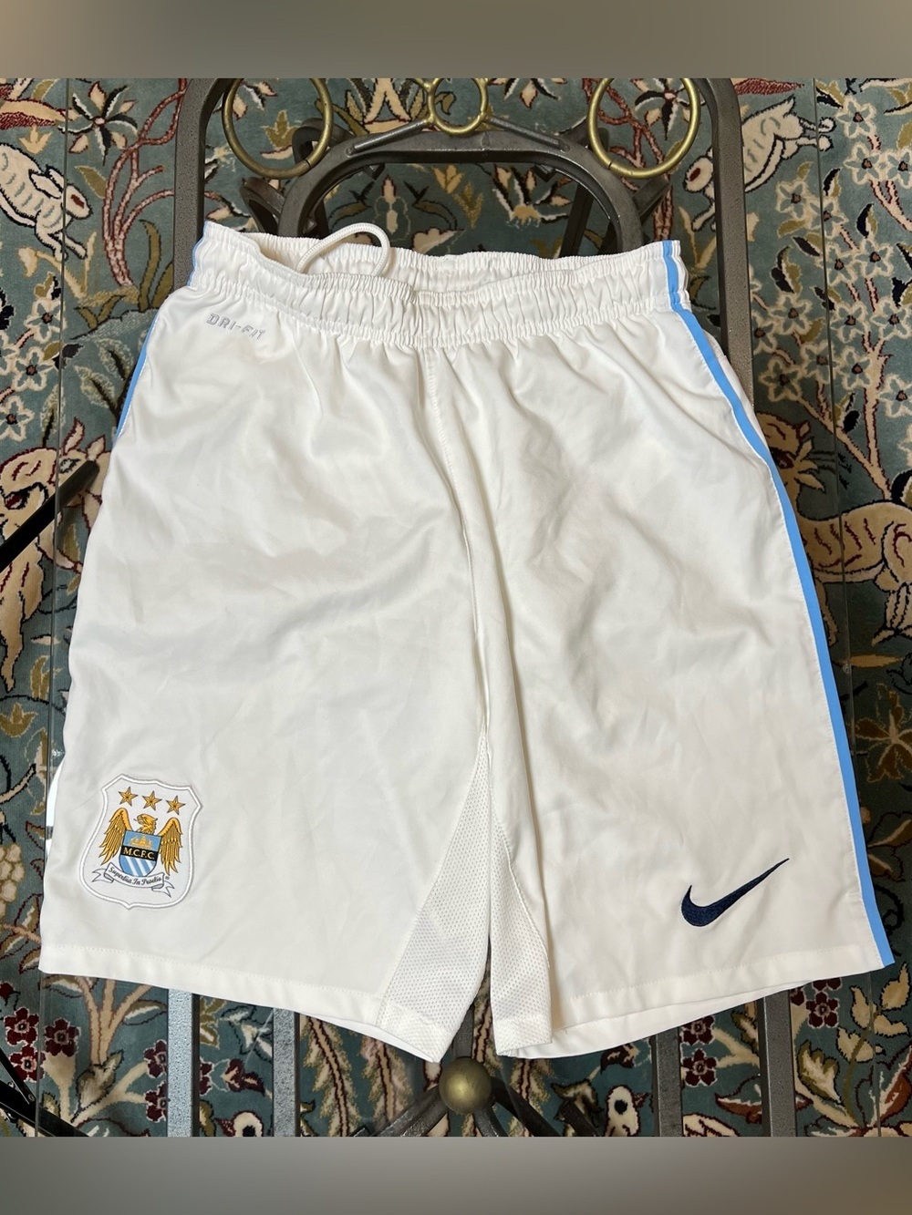 Nike Men’s White Athletic Messi Shorts with Light Blue Side Trim